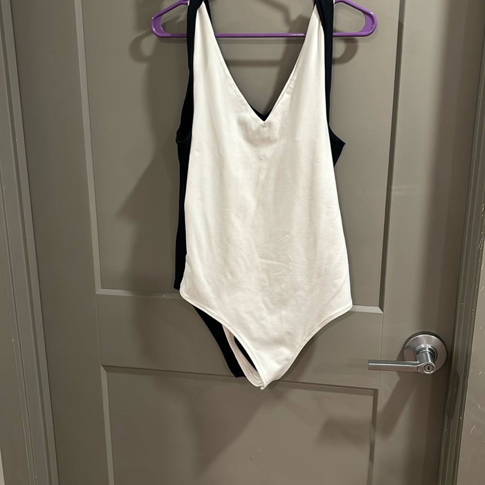 Bundle 2 bodysuits one is white and other black